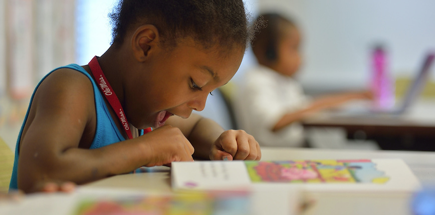  A Horizons student practices academic skills during the summer program.