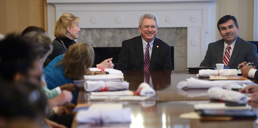 Chancellor Dan Jones and Albert Nylander speak at the Mississippi Commission for Volunteer Service meeting.