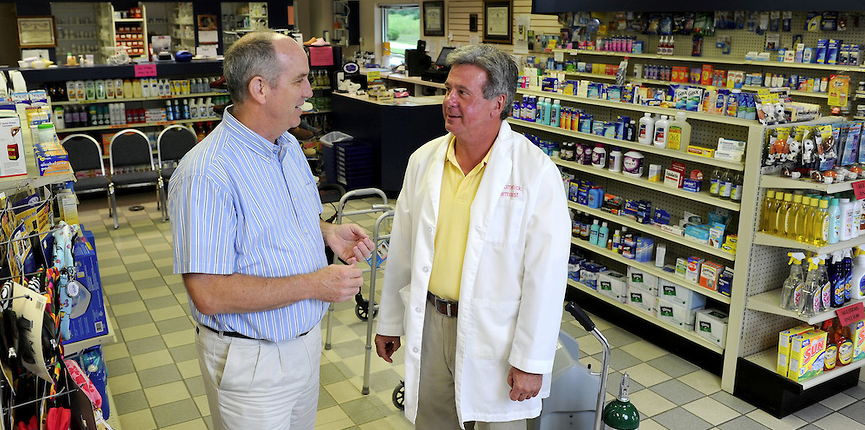 Ben Banahan meets with Bob Lomenick, owner of Tyson Pharmacy in Holly Springs, MS.