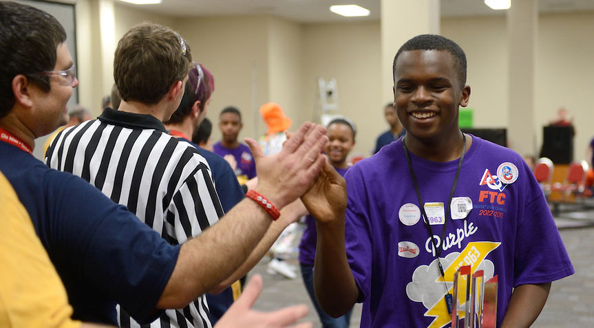 Teams congratulate each other at the FIRST Tech Challenge.